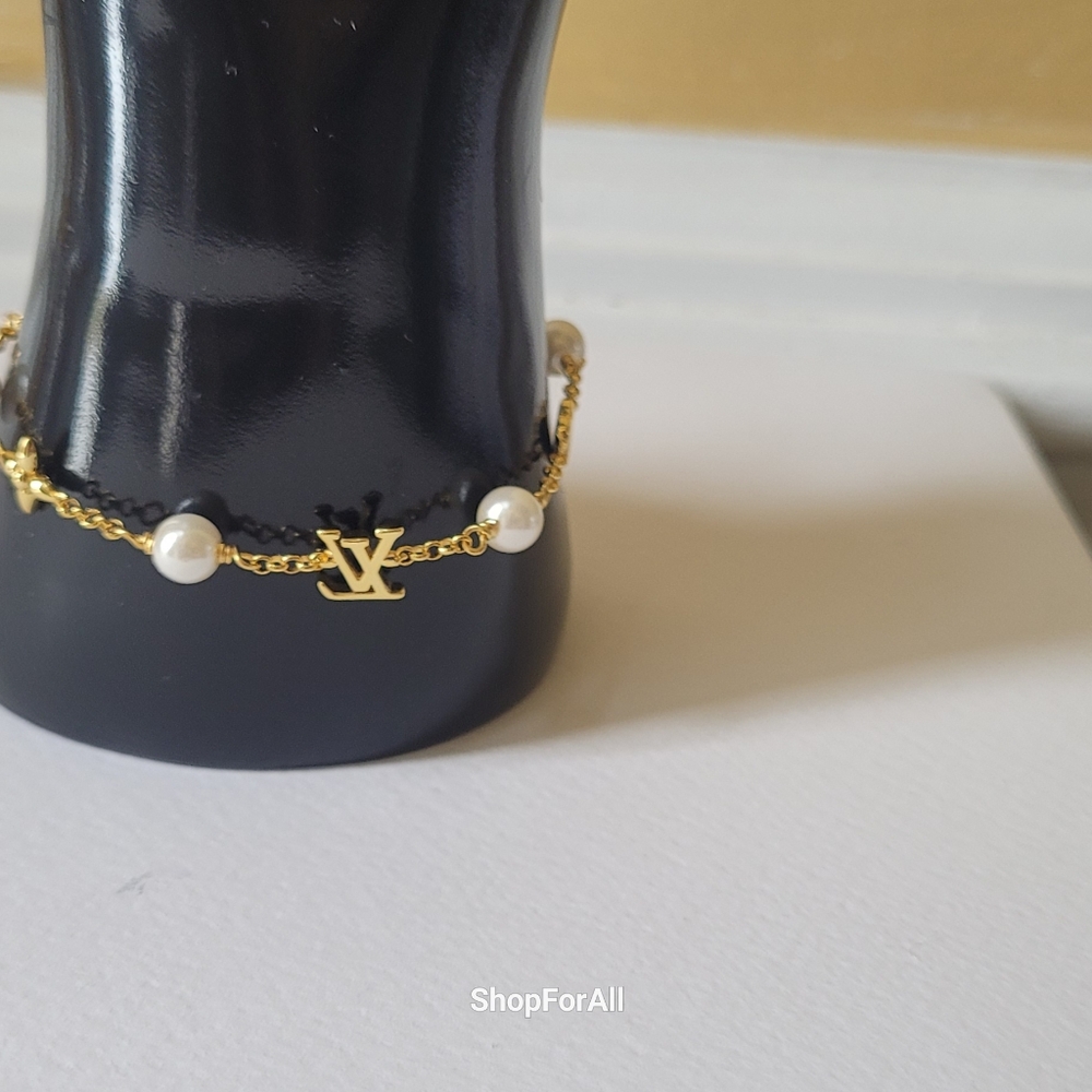 Louis Vuitton Gold Tone Charm Bracelet - Picture 10 of 17